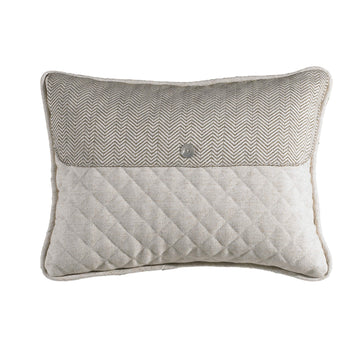 cream woven decorative pillow in a refined living room setting