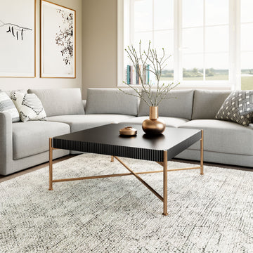 beige plush accent table in a farmhouse contemporary bedroom setting