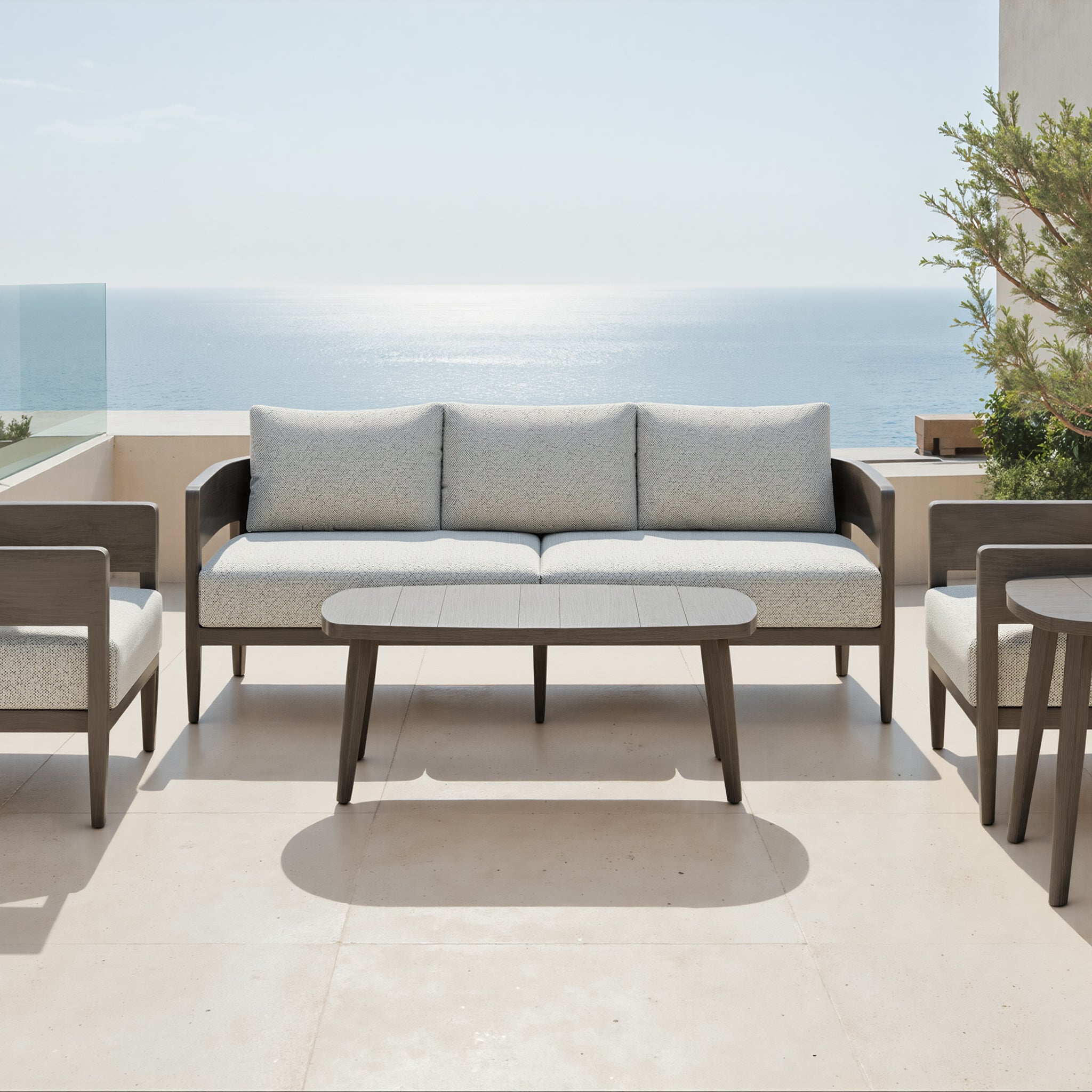 Foret Sofa Beige styled for a transitional patio space.