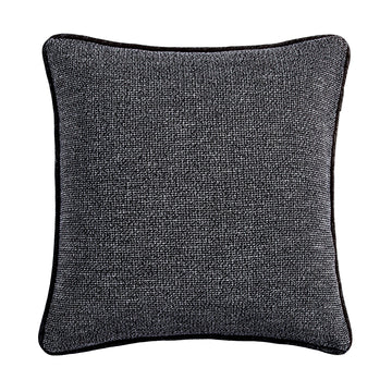 cream brushed metal pillow sham styled in a mid-century minimalist entryway