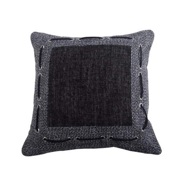 matte black linen decorative pillow styled in a minimalist elegant dining room
