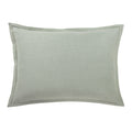 Green textured pillow on a white background