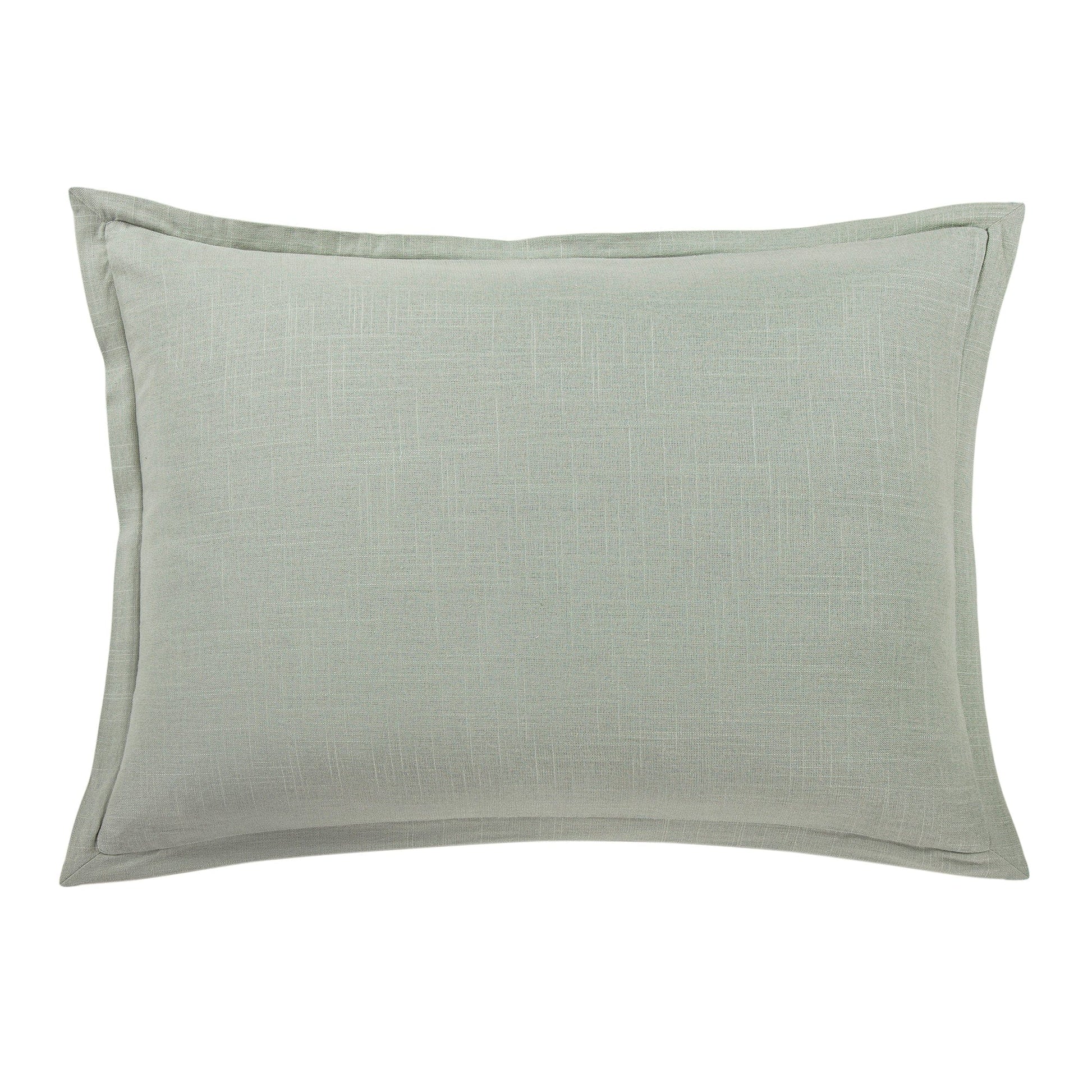 Green textured pillow on a white background