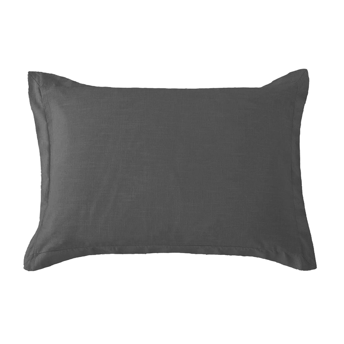 matte black linen decorative pillow styled in a minimalist elegant dining room