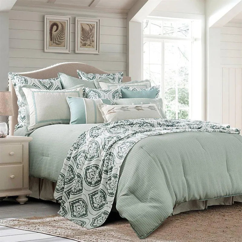 neutral linen comforter set styled in a coastal elegant dining room
