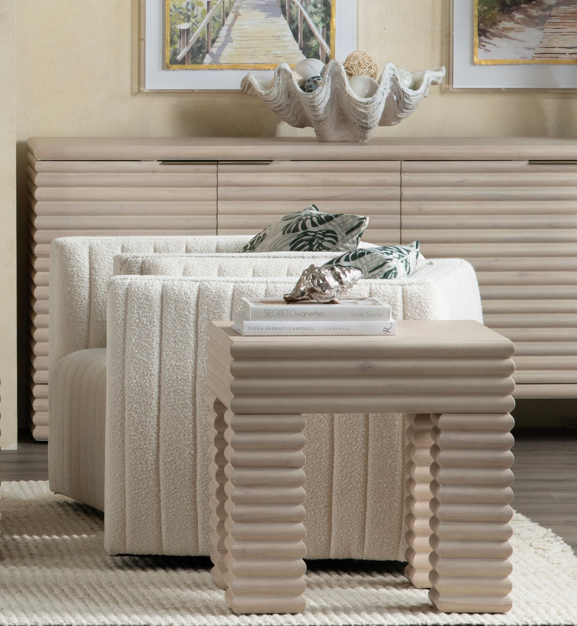 beige plush accent table in a elegant modern bedroom setting