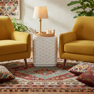 beige plush accent table in a contemporary cozy bedroom setting