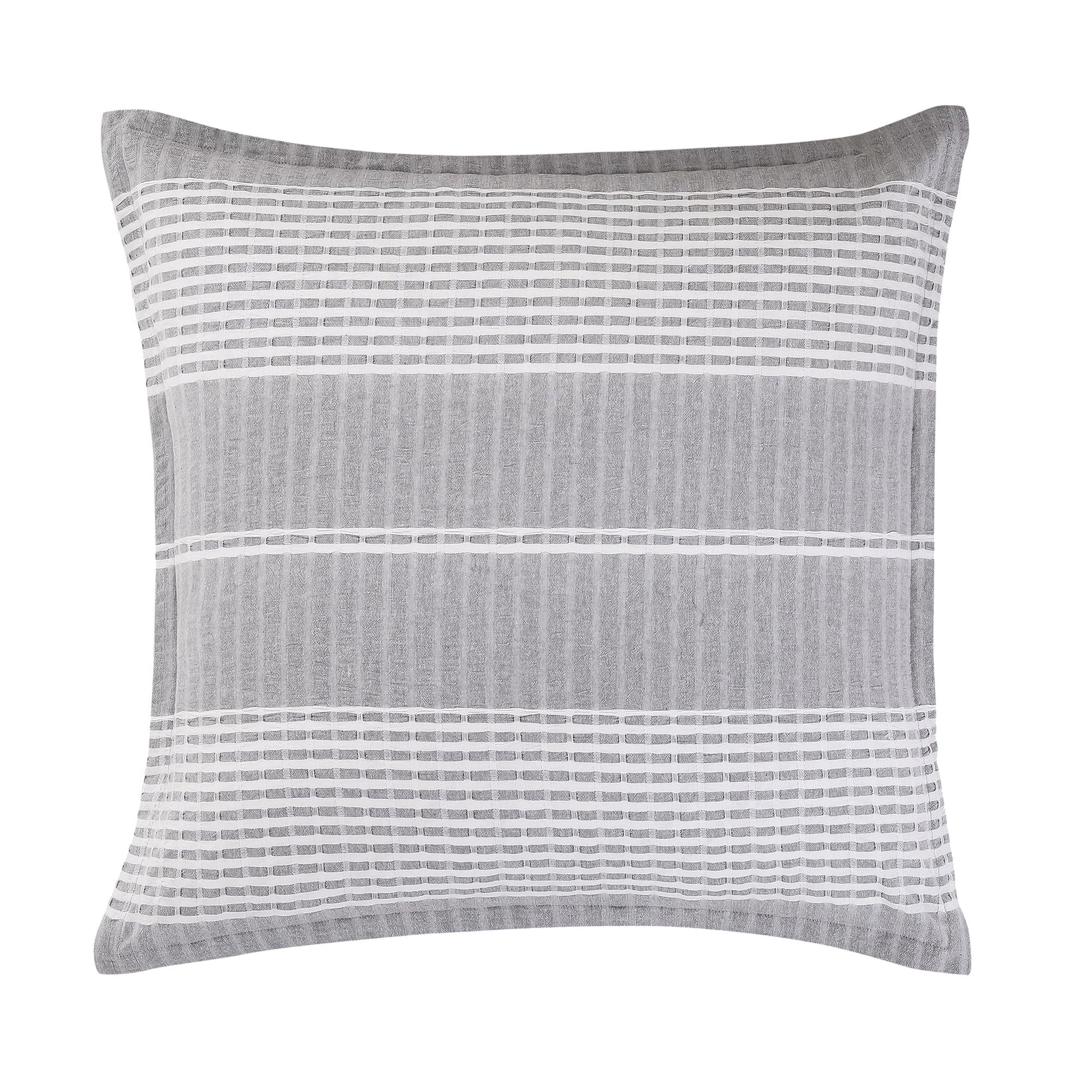 earth-toned marble pillow sham styled in a Scandinavian serene master suite