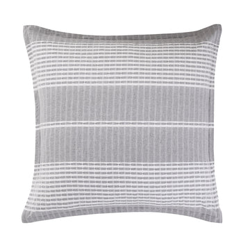earth-toned marble pillow sham styled in a Scandinavian serene master suite