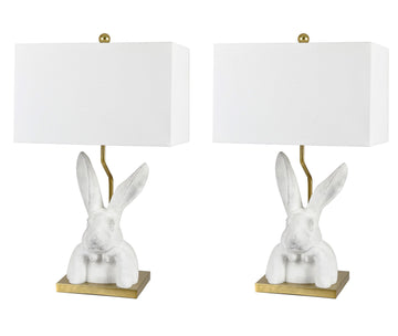 warm-toned soft table lamp in a coastal guest room setting