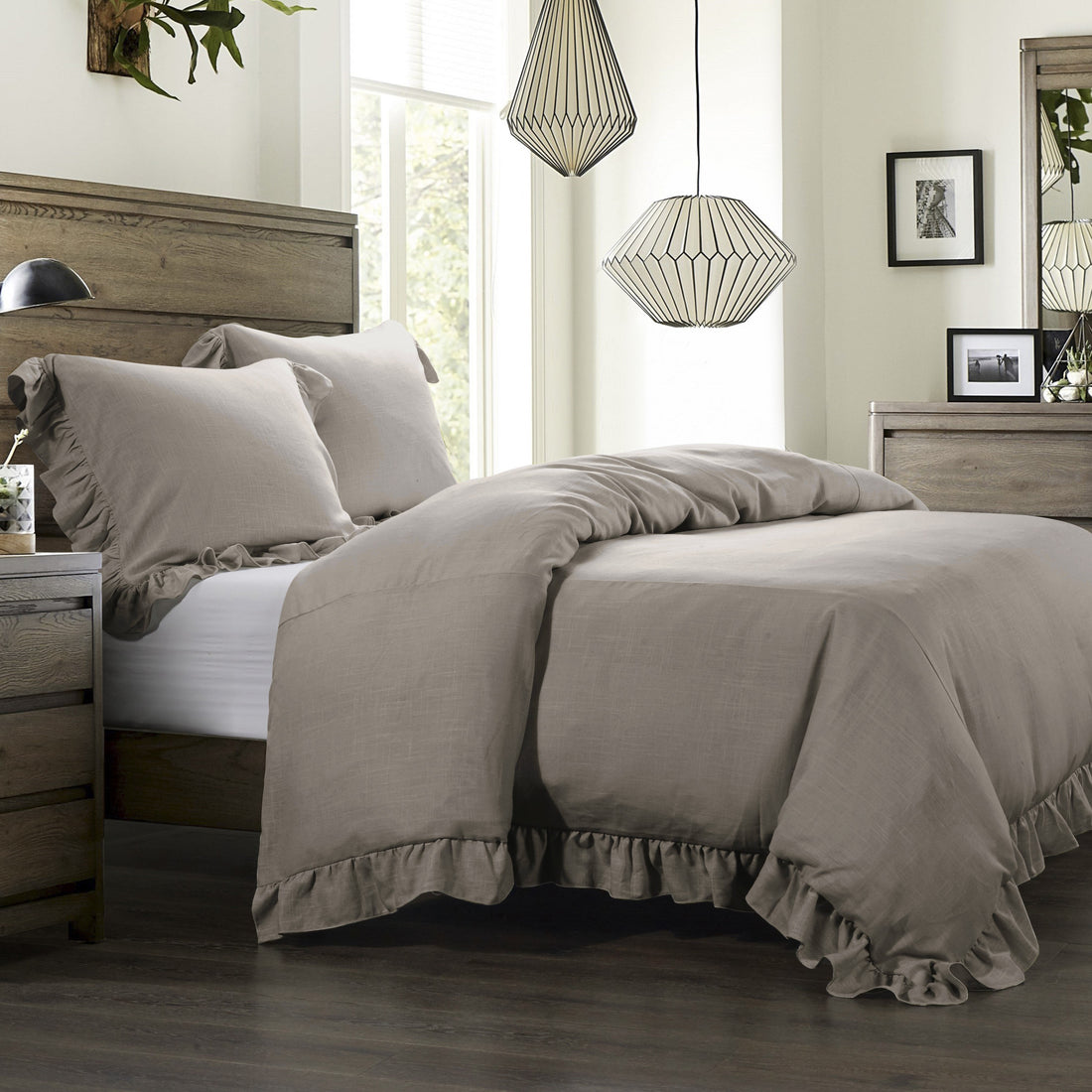 earth-toned marble duvet cover styled in a transitional serene master suite
