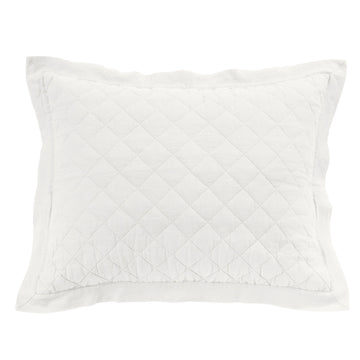 earth-toned textured pillow sham in a modern bedroom setting