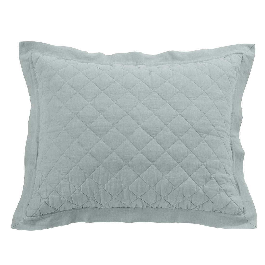 natural fabric pillow sham in a farmhouse cozy bedroom setting