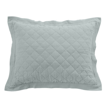 natural fabric pillow sham in a farmhouse cozy bedroom setting