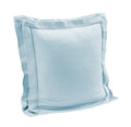 Light blue pillow with a textured surface on a white background