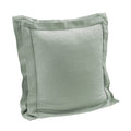 Green pillow with a textured surface on a white background