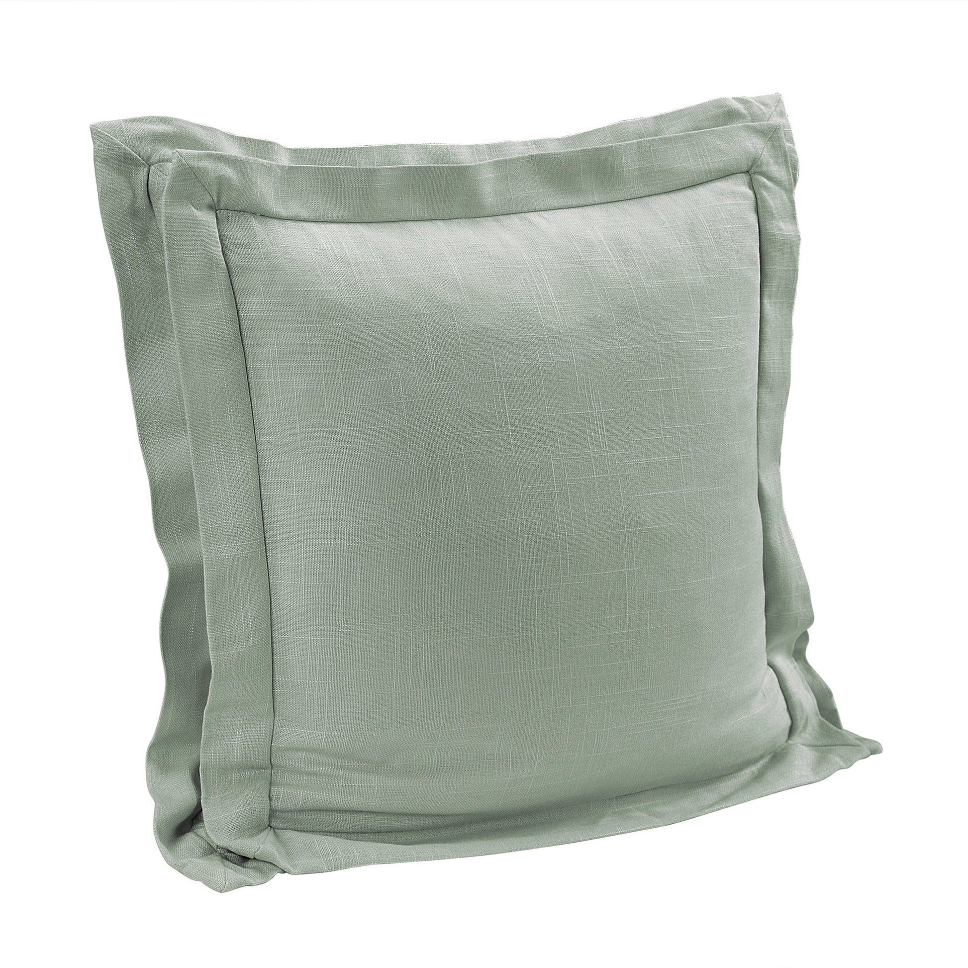 Green pillow with a textured surface on a white background