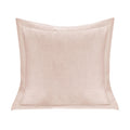 Blush pink pillow on a white background