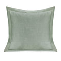 Green textured pillow on a white background