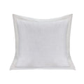 soft gray solid wood decorative pillow styled in a modern modern living room