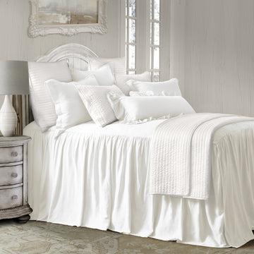 oak marble bed frame styled in a Scandinavian serene master suite