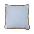 Light blue pillow with brown jute trim on a white background