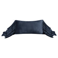 Black satin pillow with ruffled edges on a white background