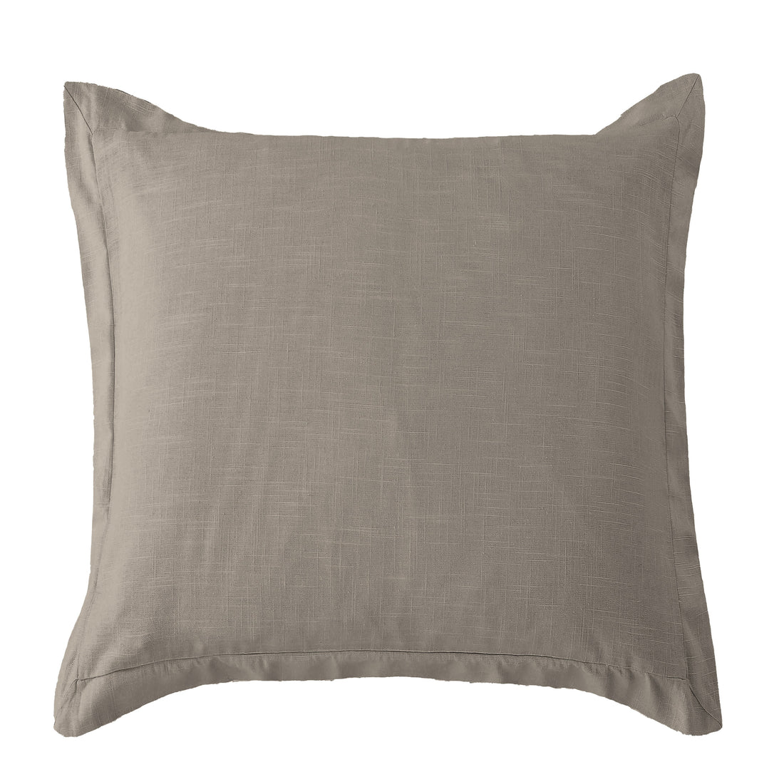 neutral linen pillow sham styled in a minimalist elegant dining room