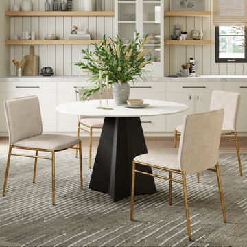 gray canvas accent table in a minimalist dining room setting