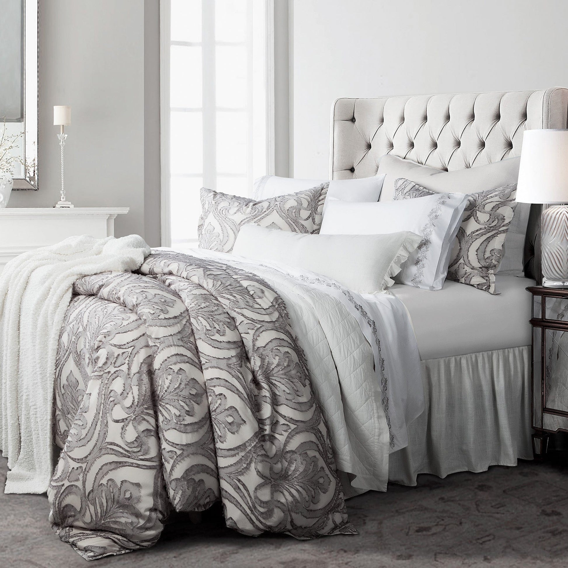 earth-toned marble duvet cover styled in a Scandinavian serene master suite