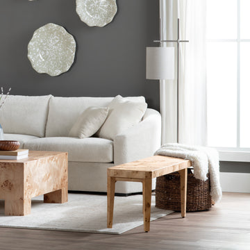 warm-toned soft accent bench in a contemporary cozy bedroom setting