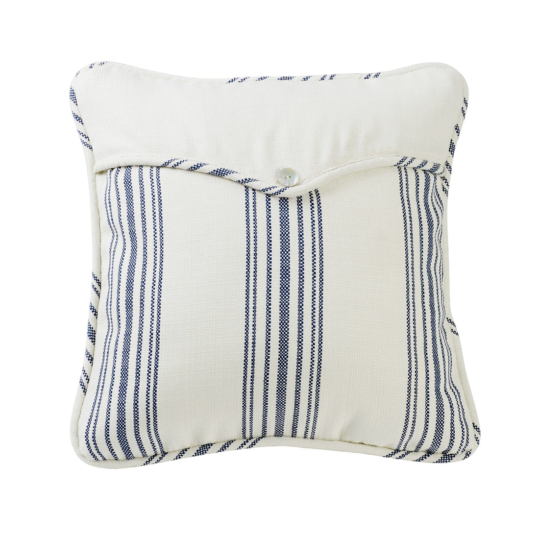 earth-toned textured decorative pillow in a farmhouse cozy bedroom setting