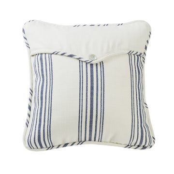 earth-toned textured decorative pillow in a farmhouse cozy bedroom setting