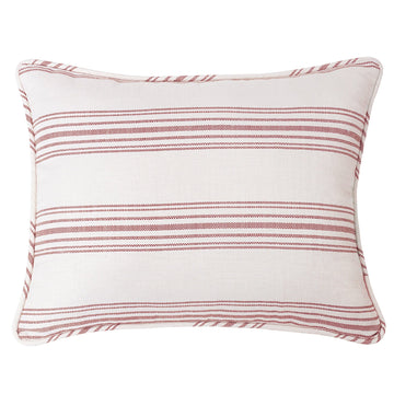 neutral-toned linen pillow sham in a minimalist guest room setting