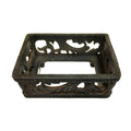 Decorative black metal tray with intricate designs on a white background
