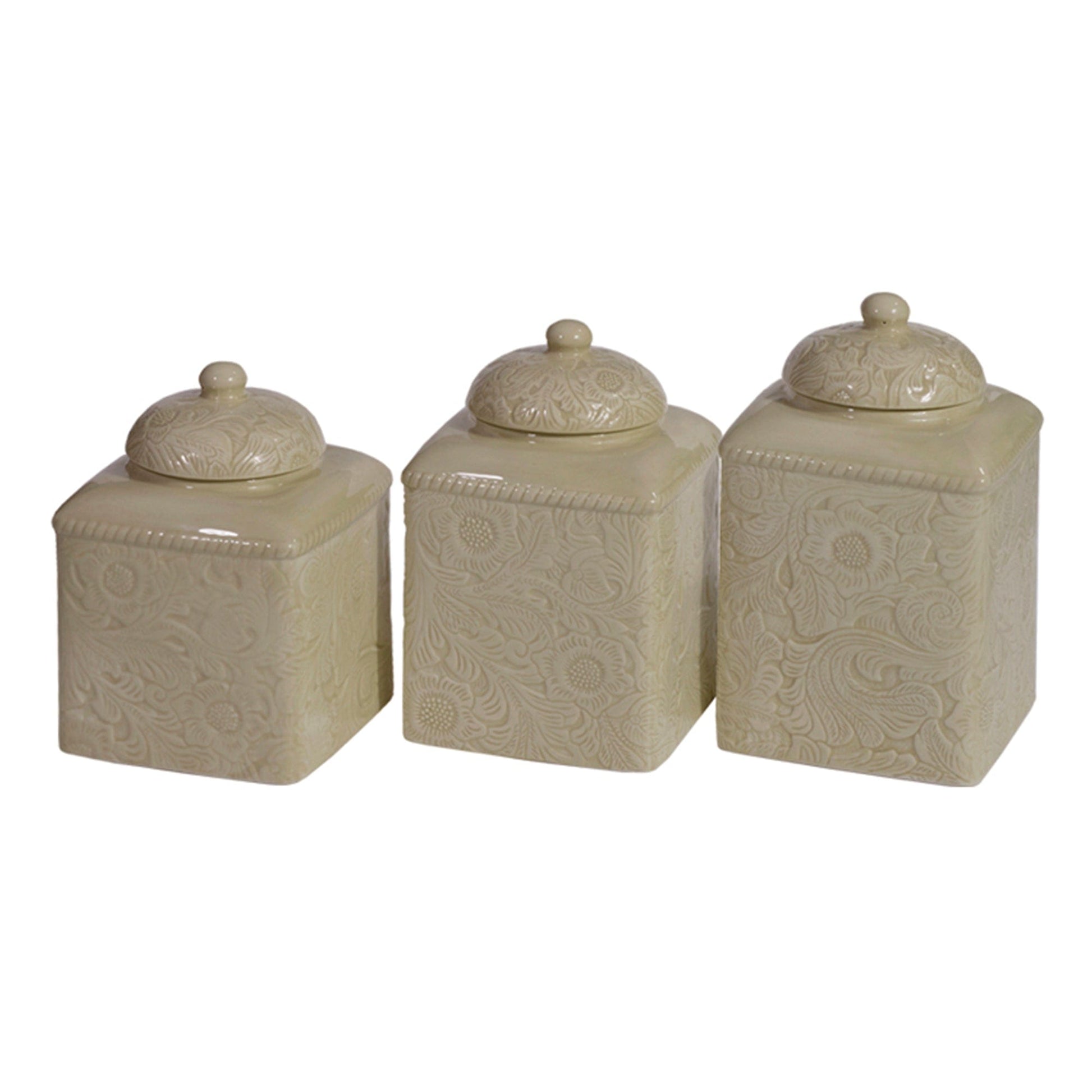 Set of three beige ceramic canisters with decorative patterns on a white background