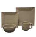 Ceramic dinnerware set with embossed patterns on a white background