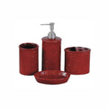 Red ceramic bathroom accessory set with embossed design on a white background