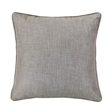 cream brushed metal pillow sham styled in a mid-century minimalist entryway