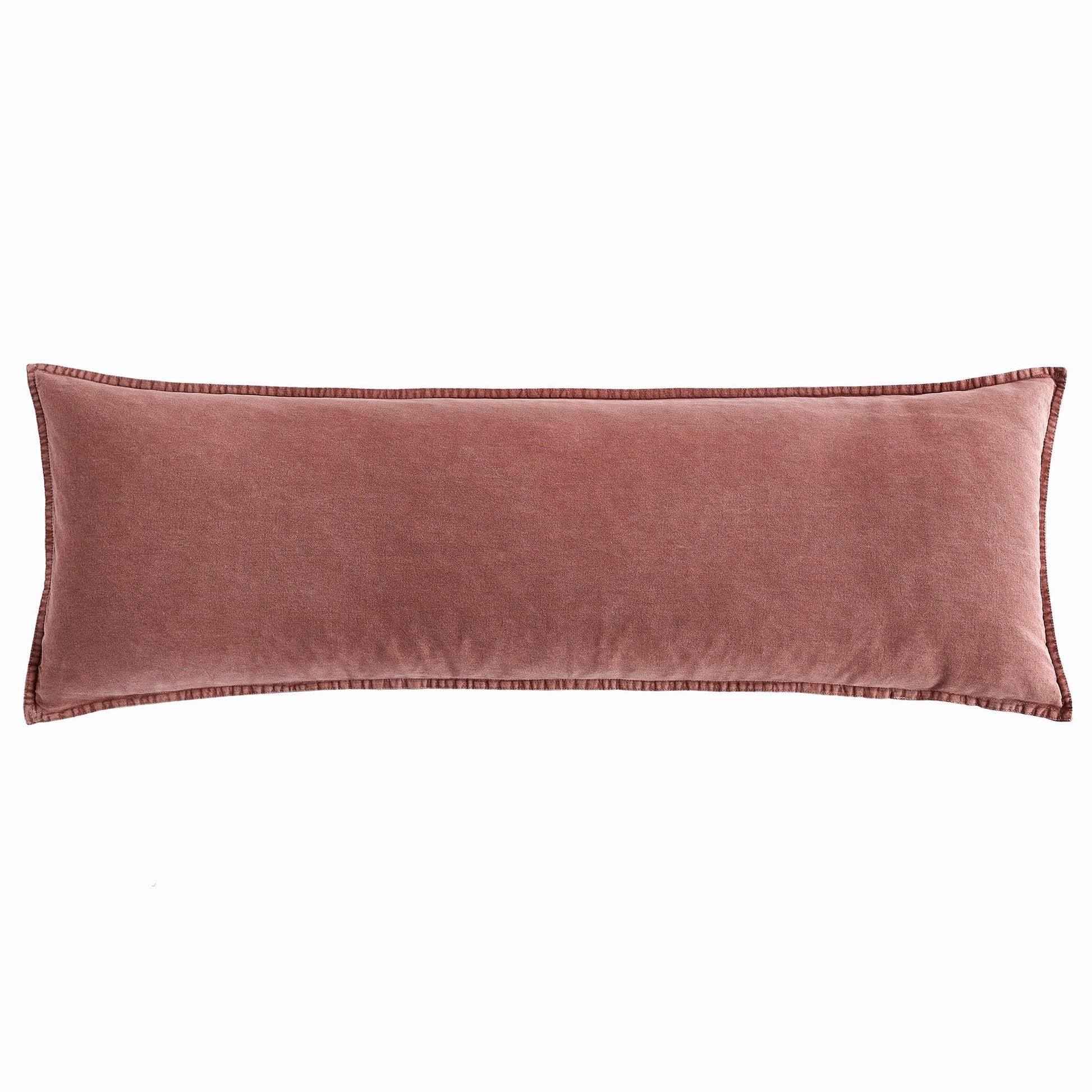 ivory soft decorative pillow in a minimalist guest room setting
