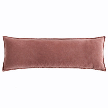 ivory soft decorative pillow in a minimalist guest room setting