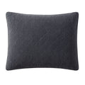 Quilted dark gray pillow on a white background