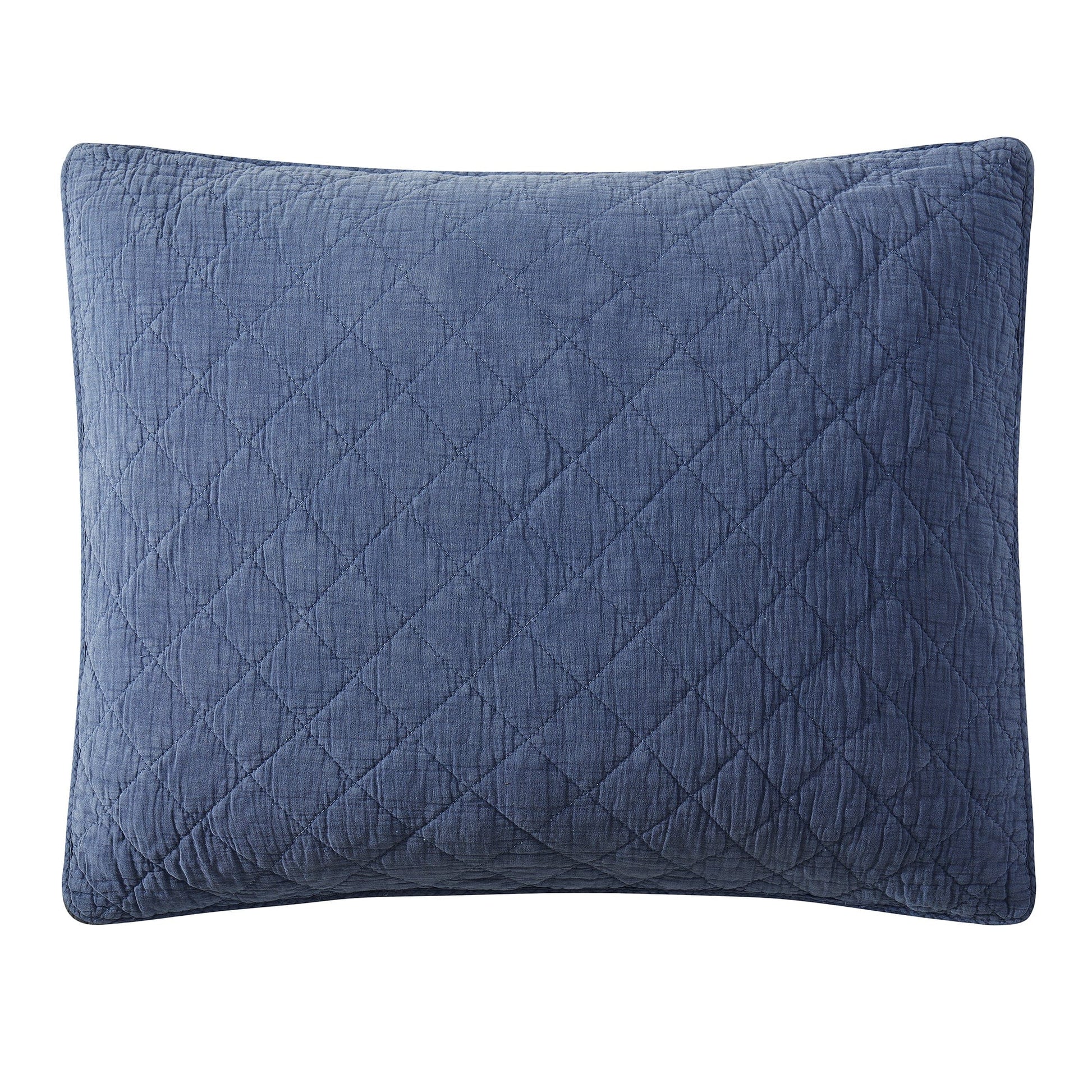 Blue quilted pillow on a white background