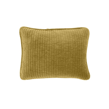 ivory soft decorative pillow in a minimalist guest room setting