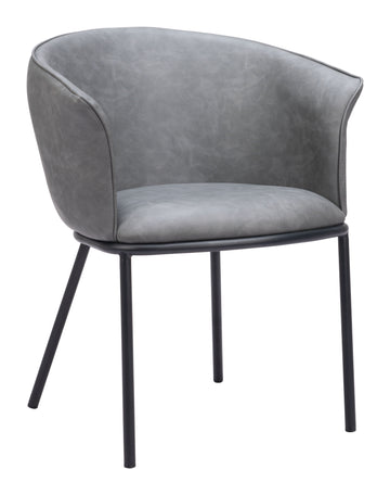 neutral linen accent chair styled in a minimalist elegant dining room