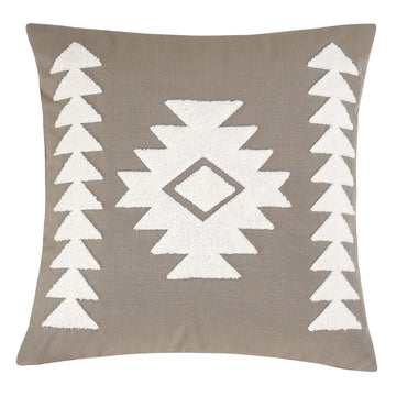 cream brushed metal decorative pillow styled in a contemporary minimalist entryway