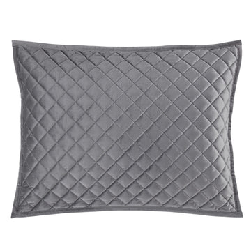 warm-toned plush pillow sham in a modern bedroom setting