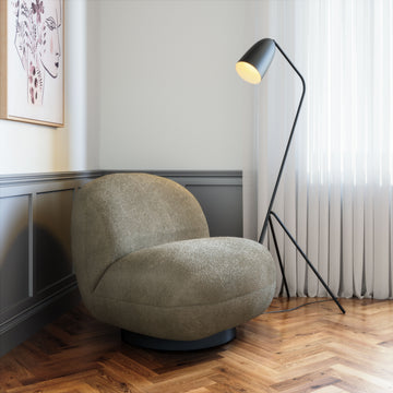 earth-toned fabric accent chair in a elegant modern bedroom setting