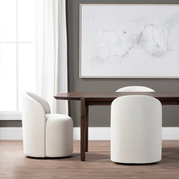 beige plush accent chair in a classic entryway setting