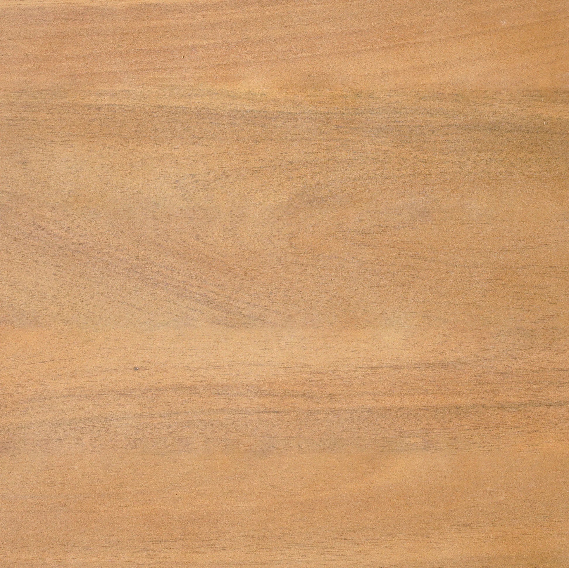 Close-up of a wooden surface of zahara coffee table natural with a warm brown color and visible grain.